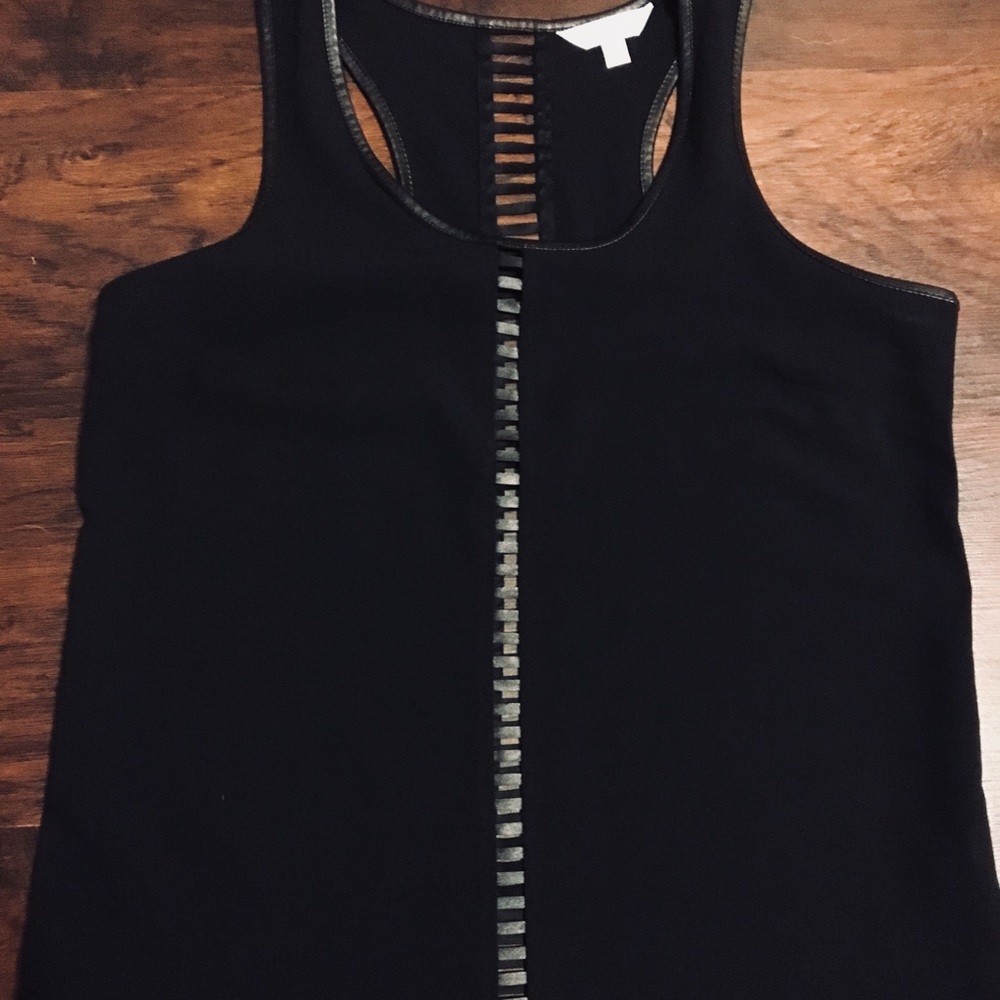 Black faux leather top.